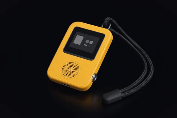 KyberDeck Card, a yellow card-sized computer with a small e-paper display, on a woven lanyard